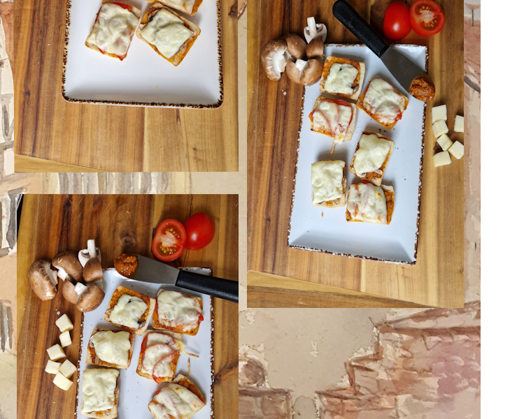Auf den Tellern sind Mini Ciabattas, Pilze, Käse und Tomaten. 